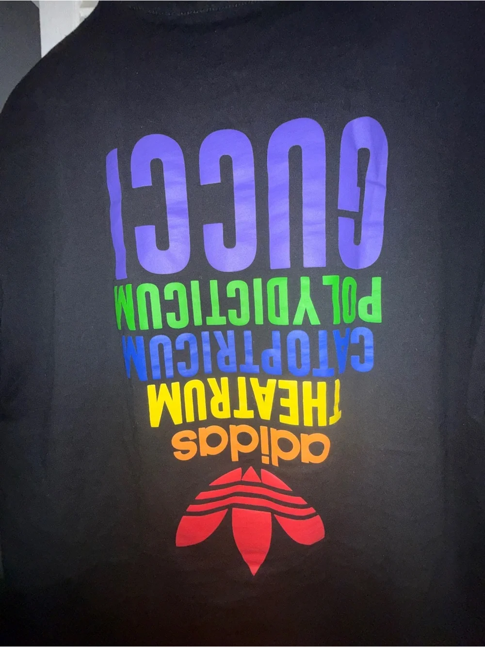 Gucci Black Tee with Red Trefoil Logo and Yellow Neck Label